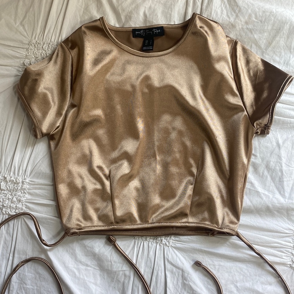 the back has some kind of fuzz on it and it has strings